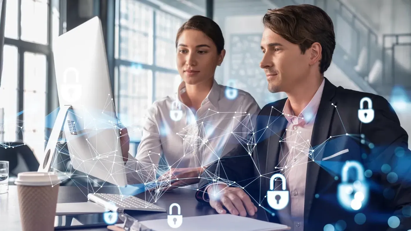 man and woman on computer