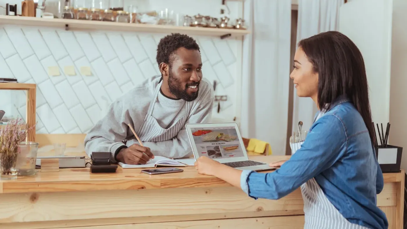 business owners discussing insurance