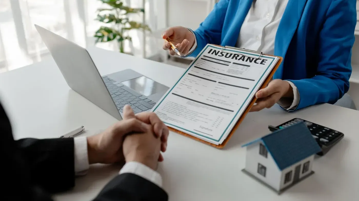person showing insurance paper