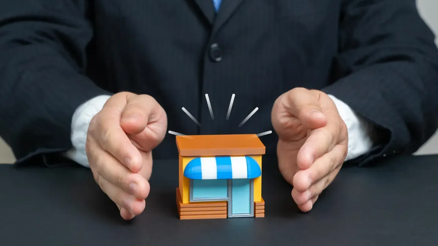 hands holding a store